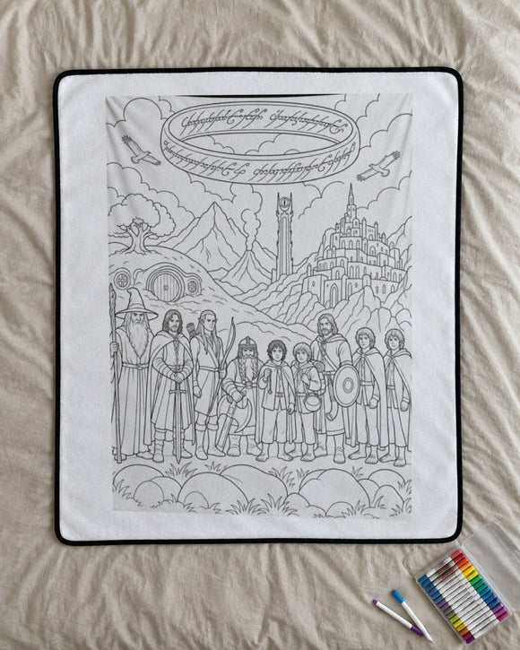 Quest Quilt fantasy coloring blanket laid flat on a bed with fabric markers